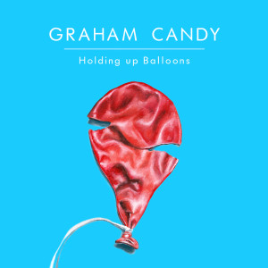 GrahamCandy_HoldingUpBalloons_800x800